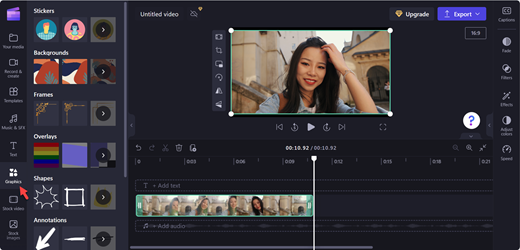 A screenshot of a Clipchamp editor's page with a pointer on the Graphics tab.